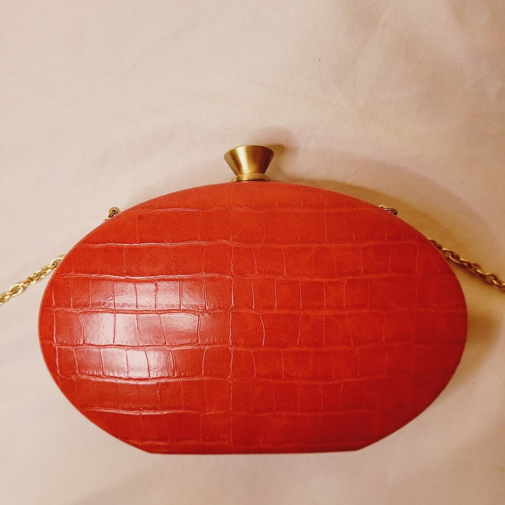 Sondra Roberts red croc embossed leather oval hard case cross body bag